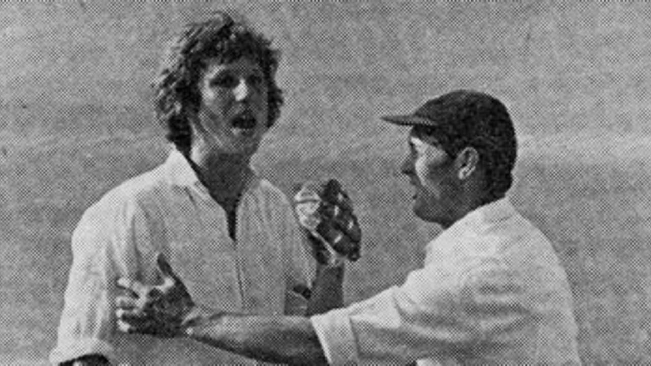 Ian Botham is helped by Peter Sainsbury after being hit by Andy Roberts