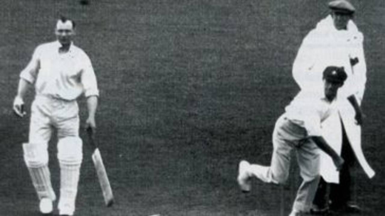 Clarrie Grimmett bowling against Surrey at The Oval in 1926. Note the one-gloved non-striker, Harry Peach.