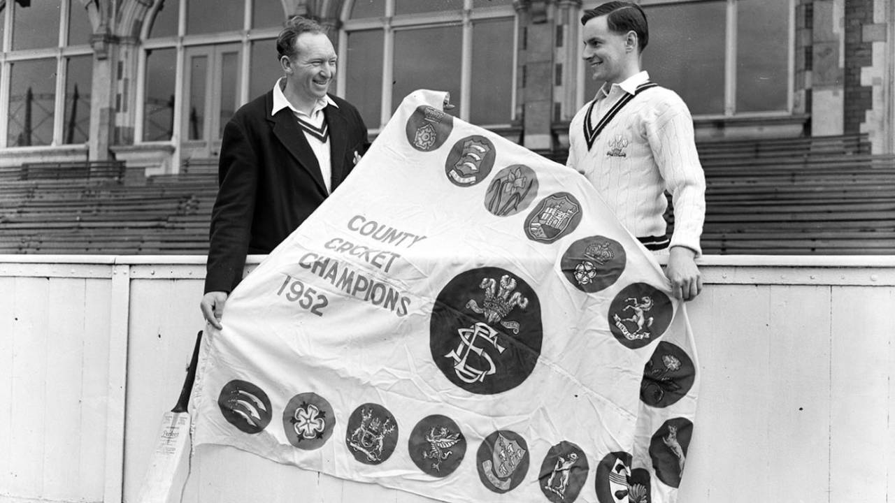 Stuart Surridge and Peter May pose with the 1952 Championship pennant&nbsp;&nbsp;&bull;&nbsp;&nbsp;Hulton Archive/Getty Images