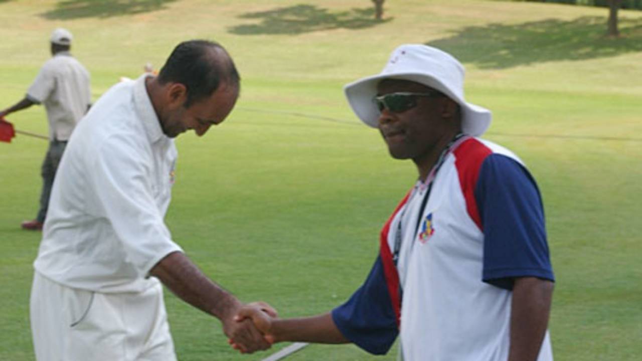 A jubilant Gus Logie congratulates Saleem Mukuddem 
