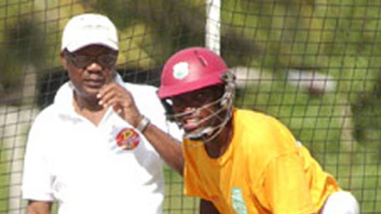 Seymour Nurse oversees Fidel Edwards in the nets at Barbados's Yorkshire Sports Club, Barbados, December 31, 2006