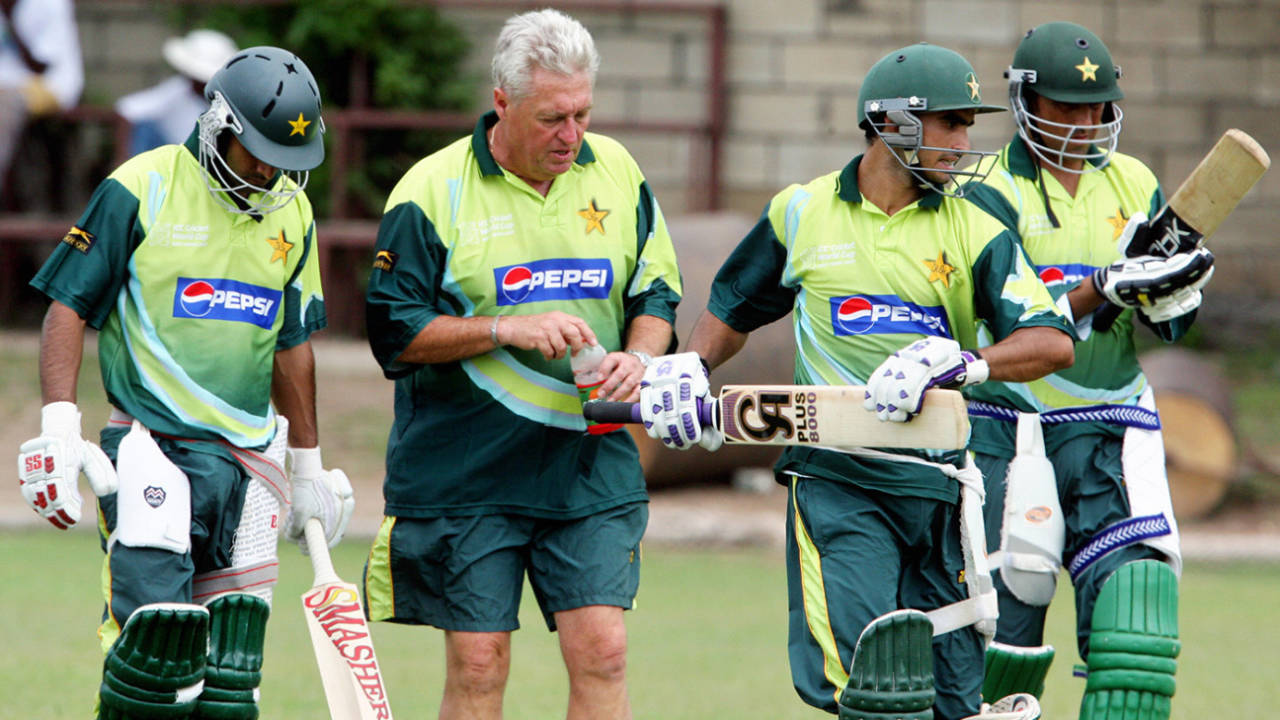 Top-order trouble: Bob Woolmer in consultation with Imran Nazir, Mohammad Hafeez  and Younis Khan during a practice session in Kingston, Jamaica, March 15, 2007