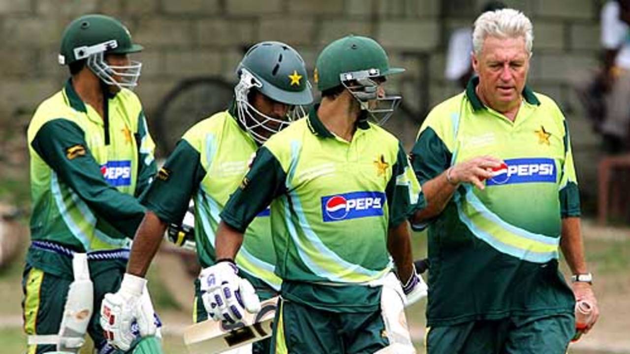 Top-order trouble: Bob Woolmer in consultation with Imran Nazir, Mohammad Hafeez  and Younis Khan during a practice session in Kingston, Jamaica, March 15, 2007