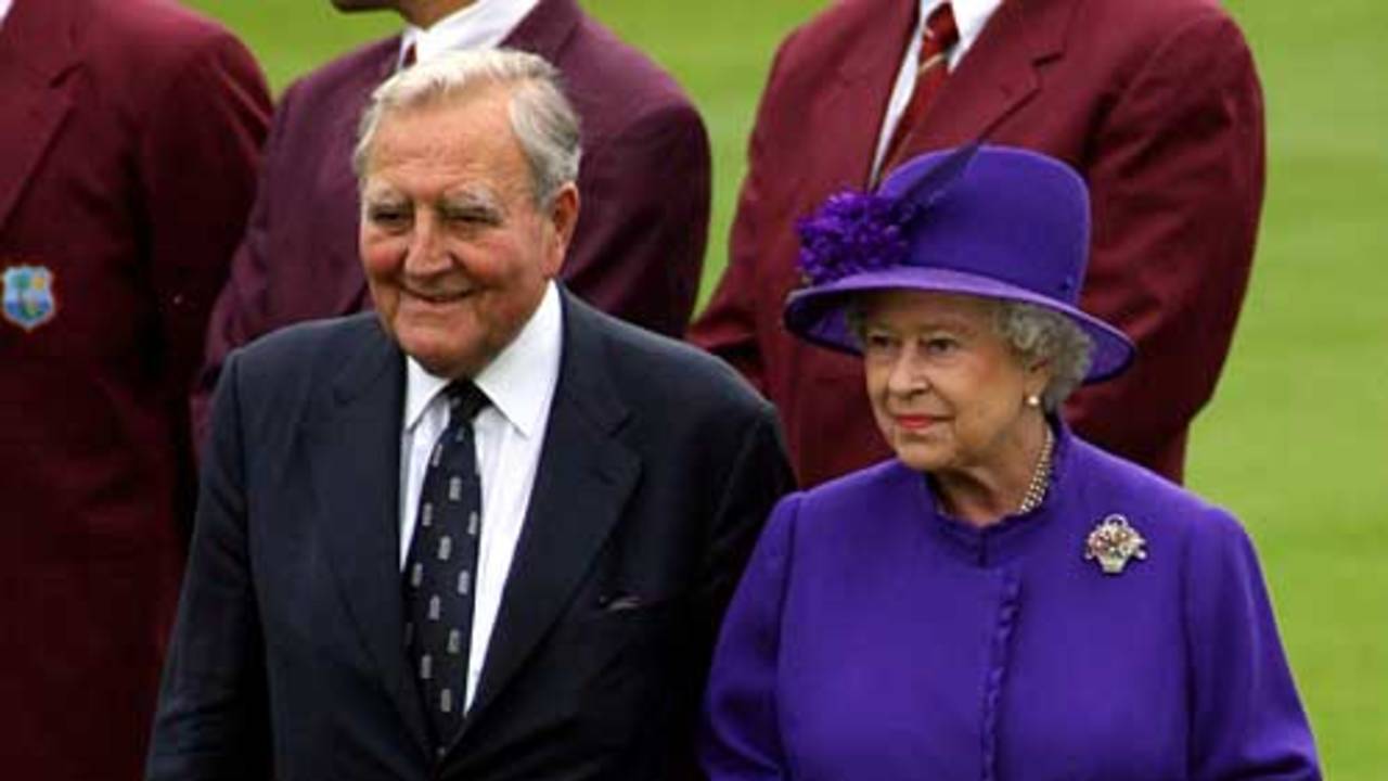Doug Insole walks with the Queen to meet the England and West Indies teams
