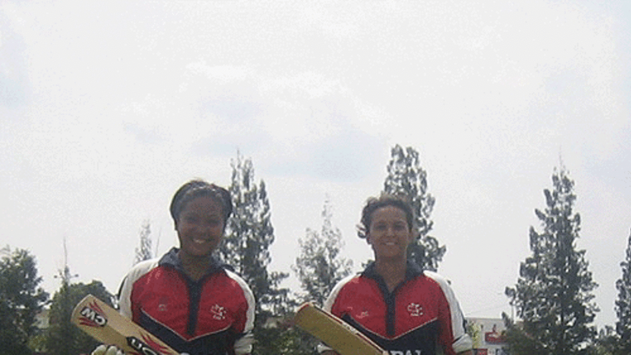 Nary Thapa (left) and Neera Rajopadhyay walk out of the ground after winning the game for Nepal against Hong Kong, Hong Kong women v Nepal women, ACC women's tournament, Johor, July 15, 2007