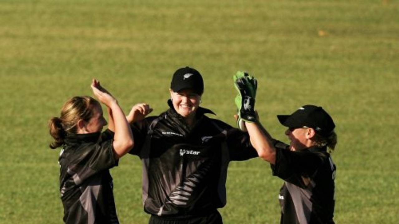 Sarah Burke is congratulated by wicketkeeper Rowan Milburn after dismissing Ellyse Perry, Australia women v New Zealand women, 2nd ODI, Darwin, July 22, 2007