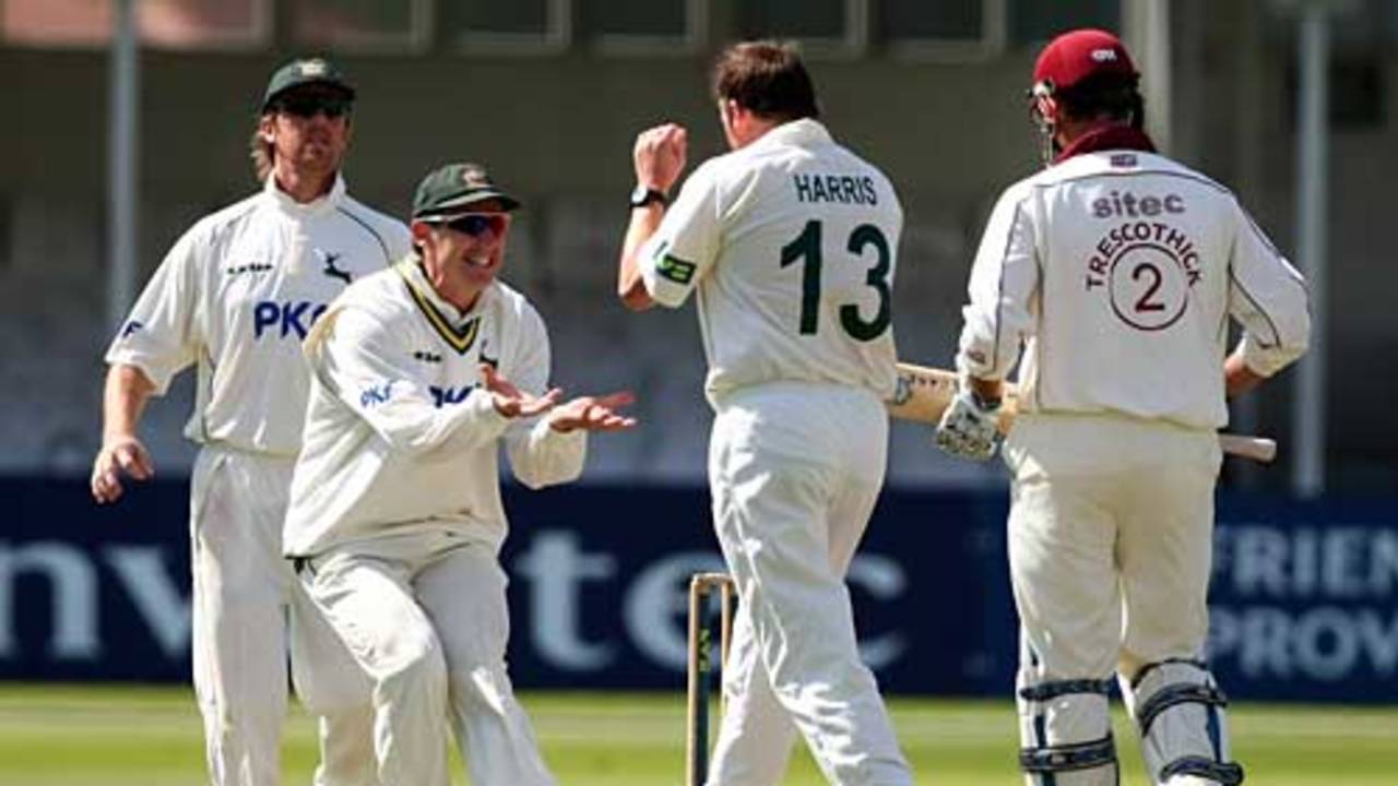 Andy Harris is congratulated on removing Marcus Trescothick