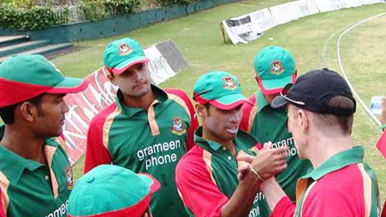 Bangladesh coach Shaun Williams gives a pep talk to his boys