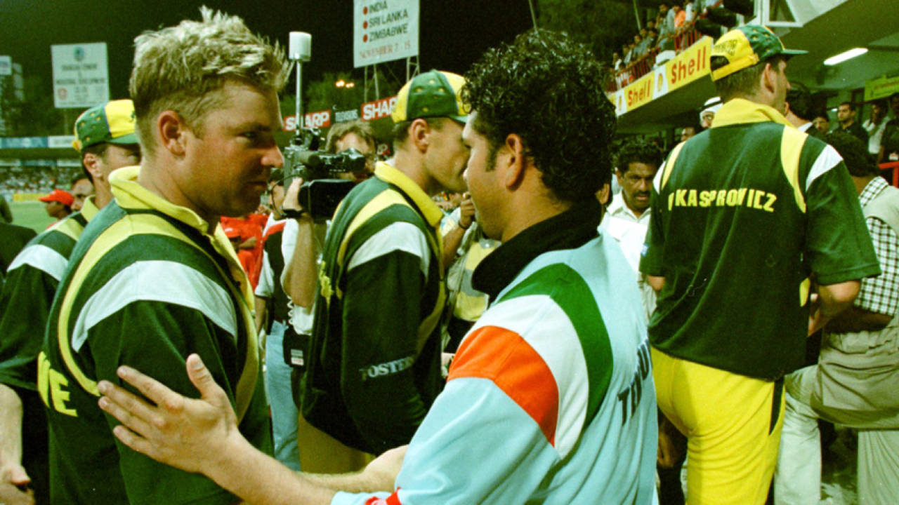 Shane Warne greets Sachin Tendulkar after India's victory in the final, Australia v India, Sharjah, April 24, 1998