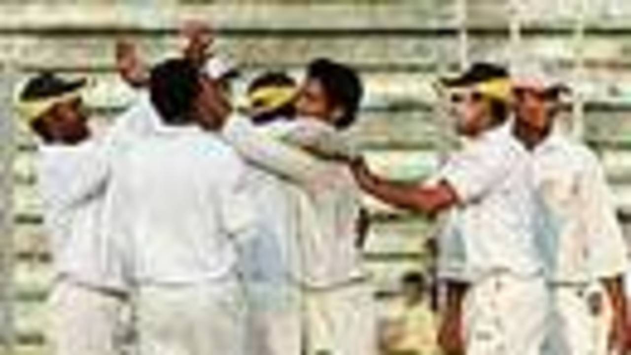 Chittagong players congratulate Kamrul Islam, Dhaka v Chittagong, National Cricket League, Mirpur, 4th day, November 13, 2007