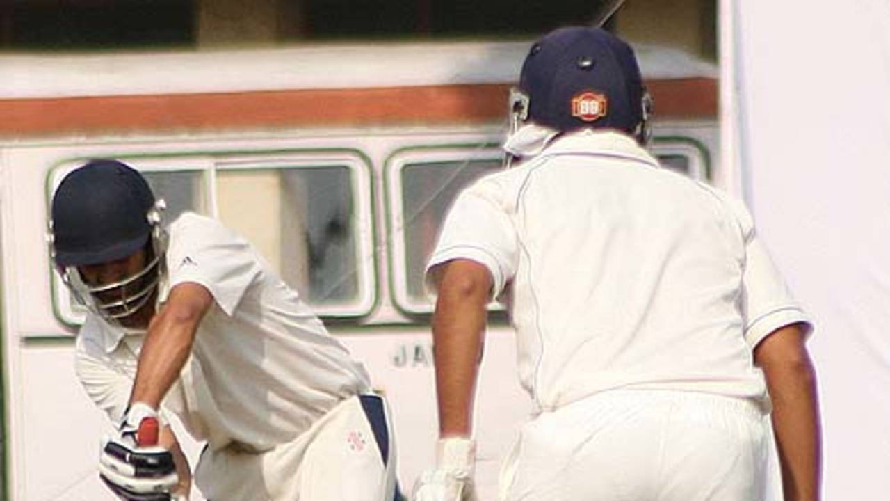 Ian Dev Singh defends a delivery during his 104