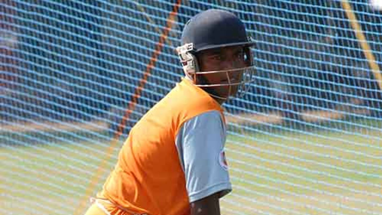 Kiran Powar has a hit in the nets during a Mumbai Champs training session