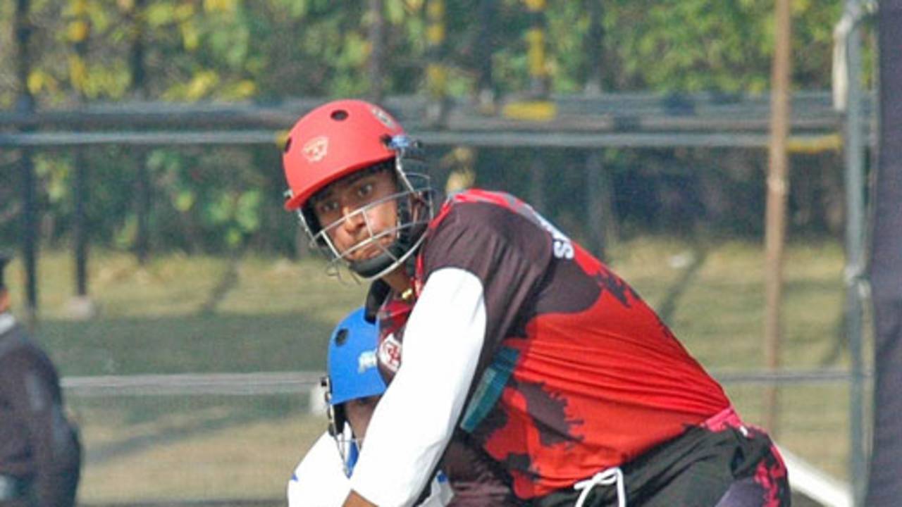 Shibsagar Singh prepares to launch the ball into orbit, Delhi Jets v Kolkata Tigers, 3rd Place Playoff, Indian Cricket League, Panchkula, December 16, 2007 

