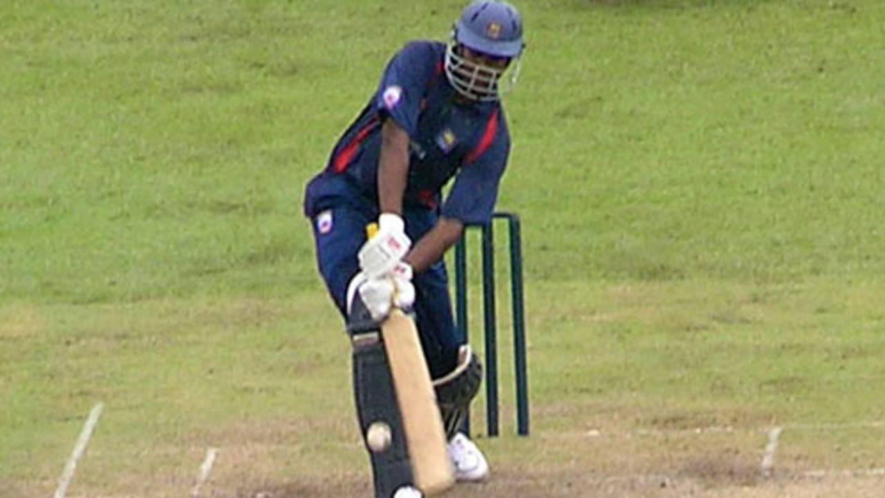 Man-of-the-Match Nuwan Zoysa smashes a six during his 29-ball 48