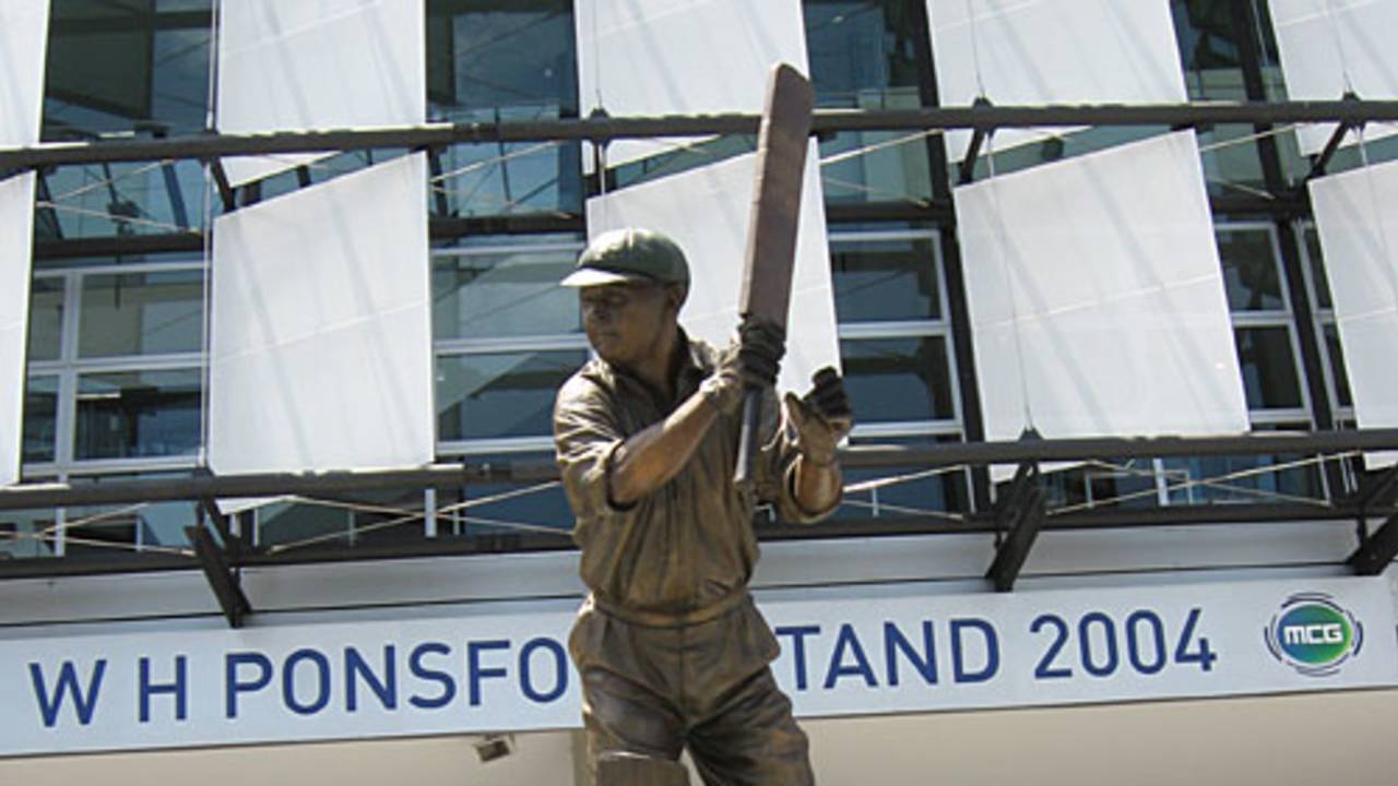 A statue of Bill Ponsford outside the WH Ponsford Stand at the MCG