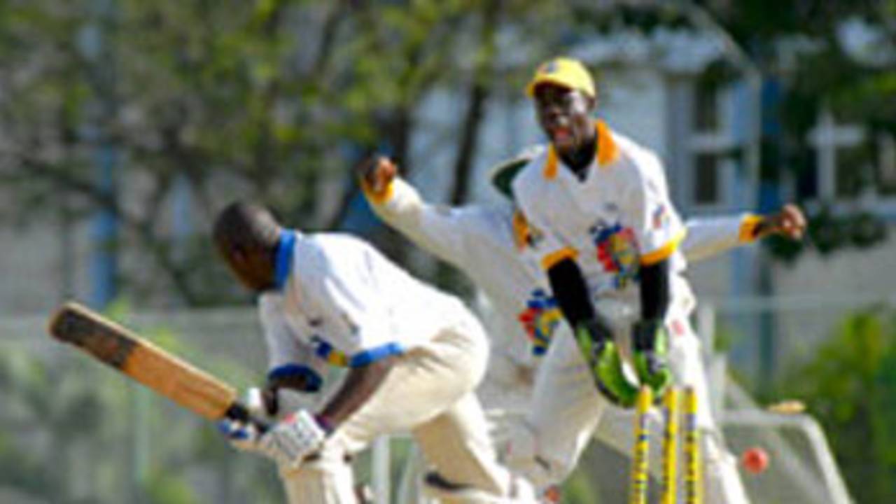 Carlo Morris is deceived by the flight of left-arm spinner Kavesh Kantasingh