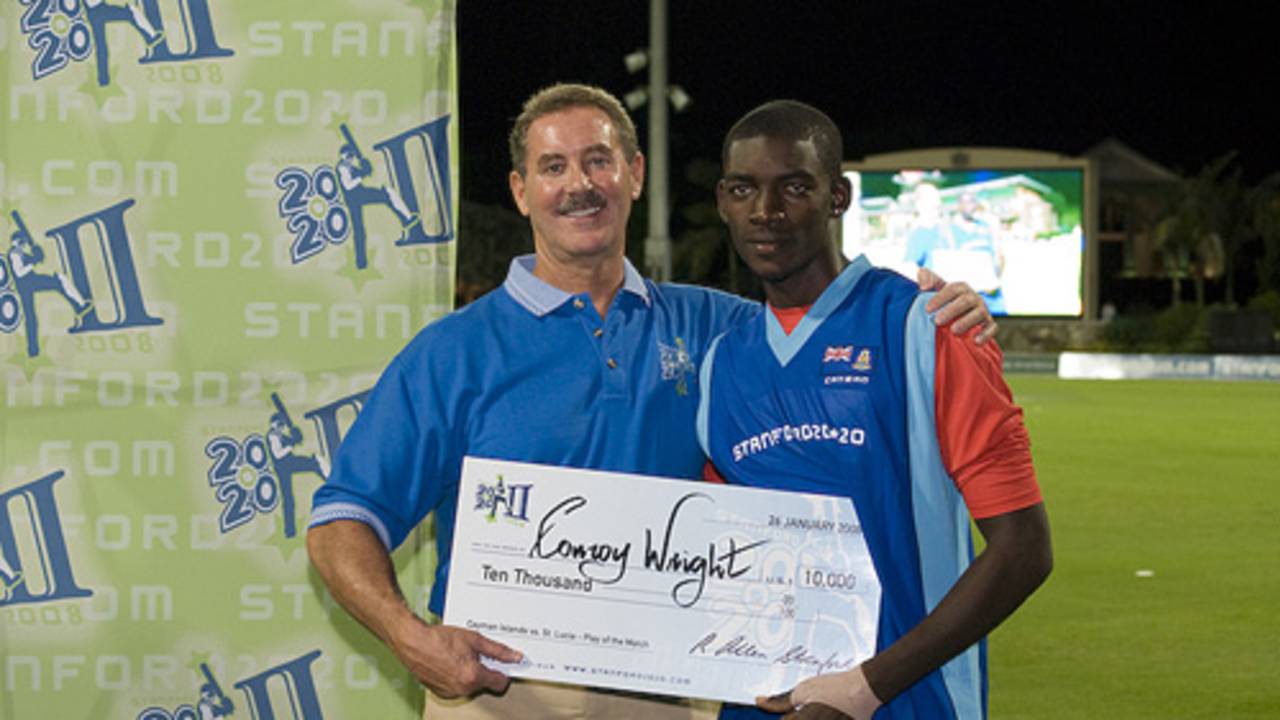 Cayman Islands' receives the Play-of-the-Day award from Allen Stanford, Cayman Islands v St Lucia, 2nd match, Stanford 20/20, Antigua, January 26, 2008