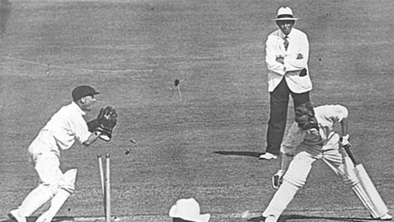 Bert Oldfield stumps Joseph Hardstaff Jr for 20 in England's second innings of the first Test in Brisbane, 1936-37