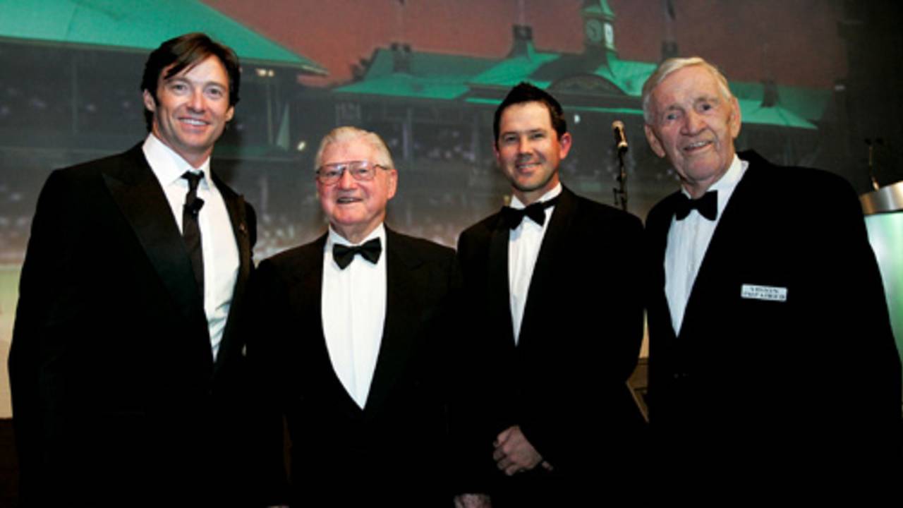 Hugh Jackman, Neil Harvey, Ricky Ponting and Sam Loxton pose for the cameras ahead of the dinner to commemorate Don Bradman's birth centenary, Sydney, August 27, 2008