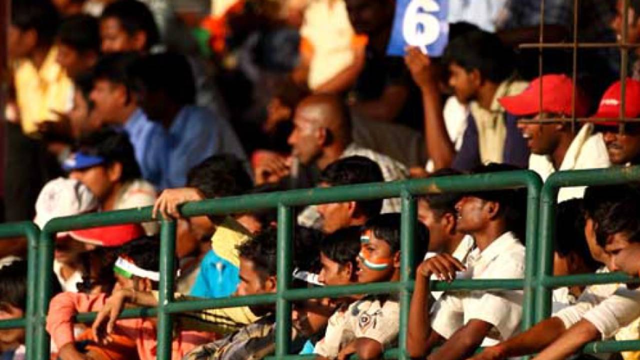 A few kids get hold of a vantage point to watch the game, India v Australia, 1st Test, 3rd day, Bangalore, October 11, 2008
