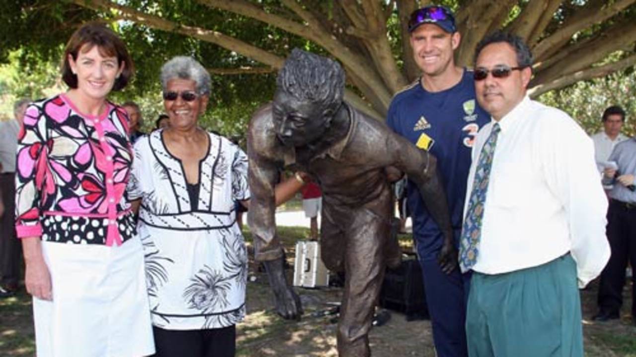 Judy Spence, Valda Coolwell, Matthew Hayden and Larry Budd pose after the unveiling of a statue of Eddie Gilbert, Allan Border Field, Brisbane, November 16, 2008