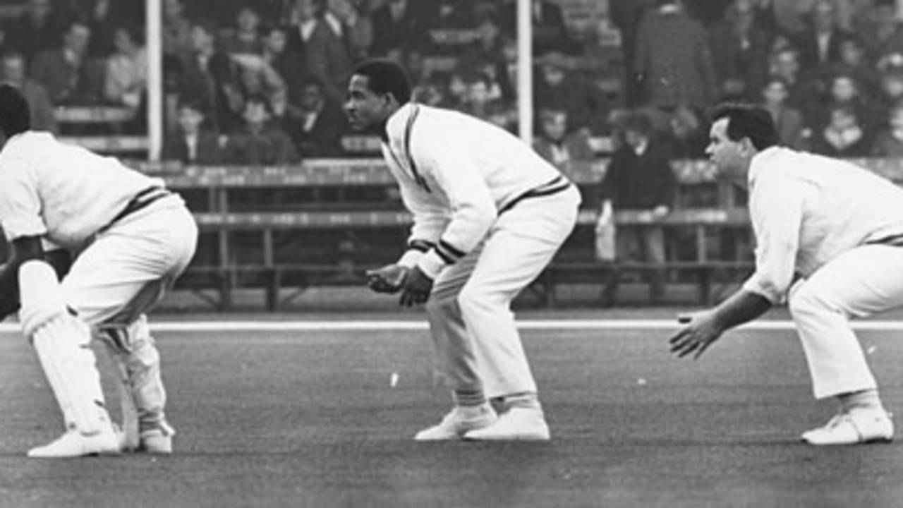 Deryck Murray, Garry Sobers, and Norman Hill get in position before the ball is delivered