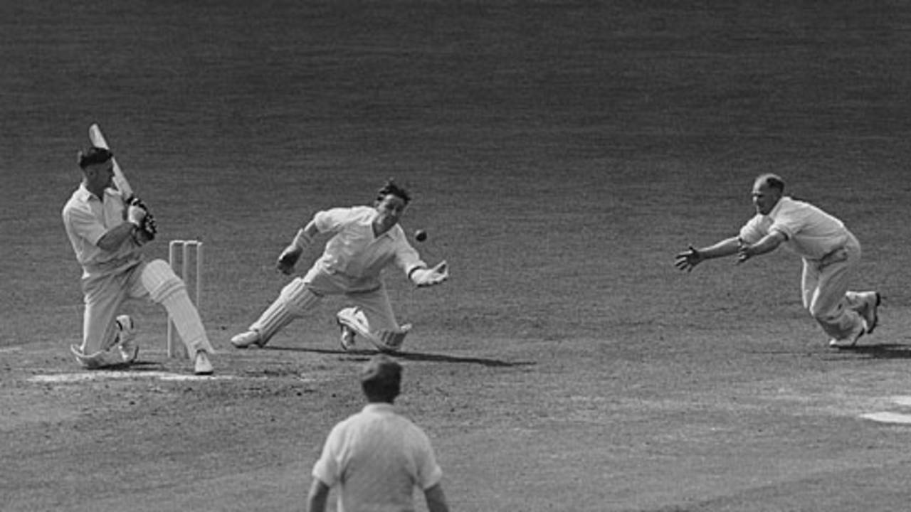 Keeper Harold Stephenson and fielder John Lawrence try to catch a ball off Surrey's Geoffrey Whittaker, Surrey v Somerset, County Championship, 2nd day, The Oval, May 24, 1951