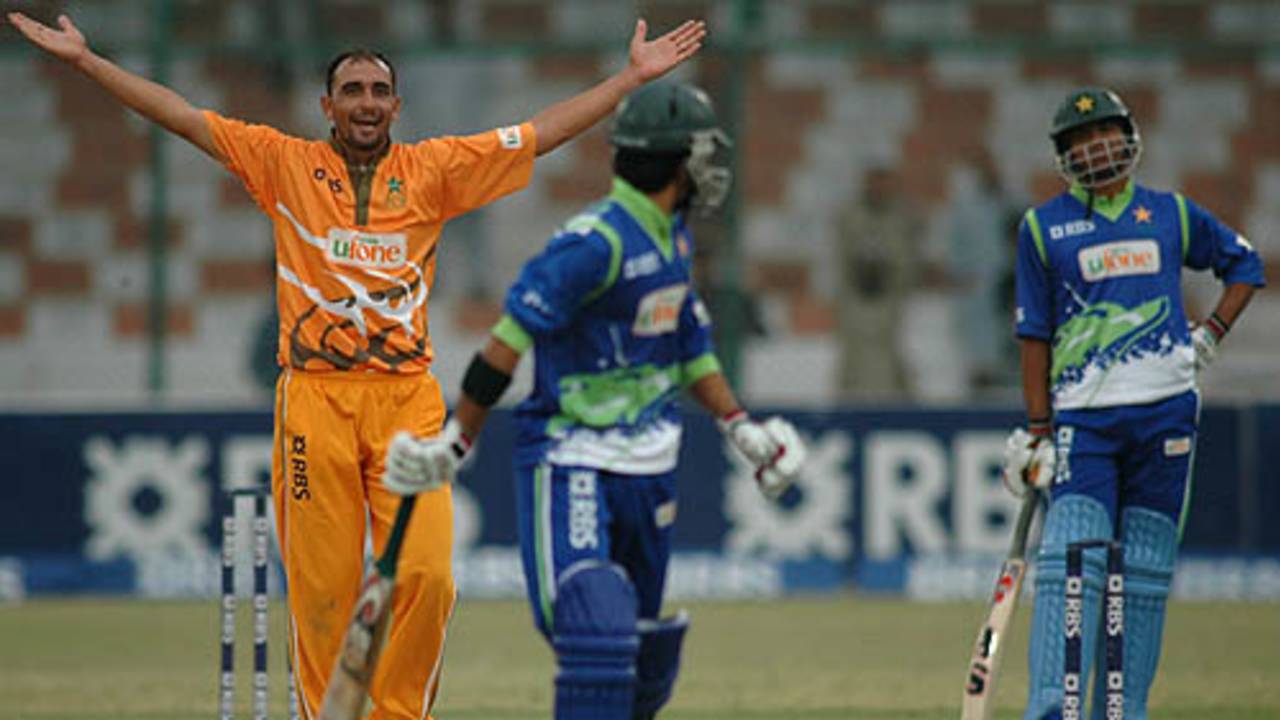 Samiullah Khan celebrates a wicket