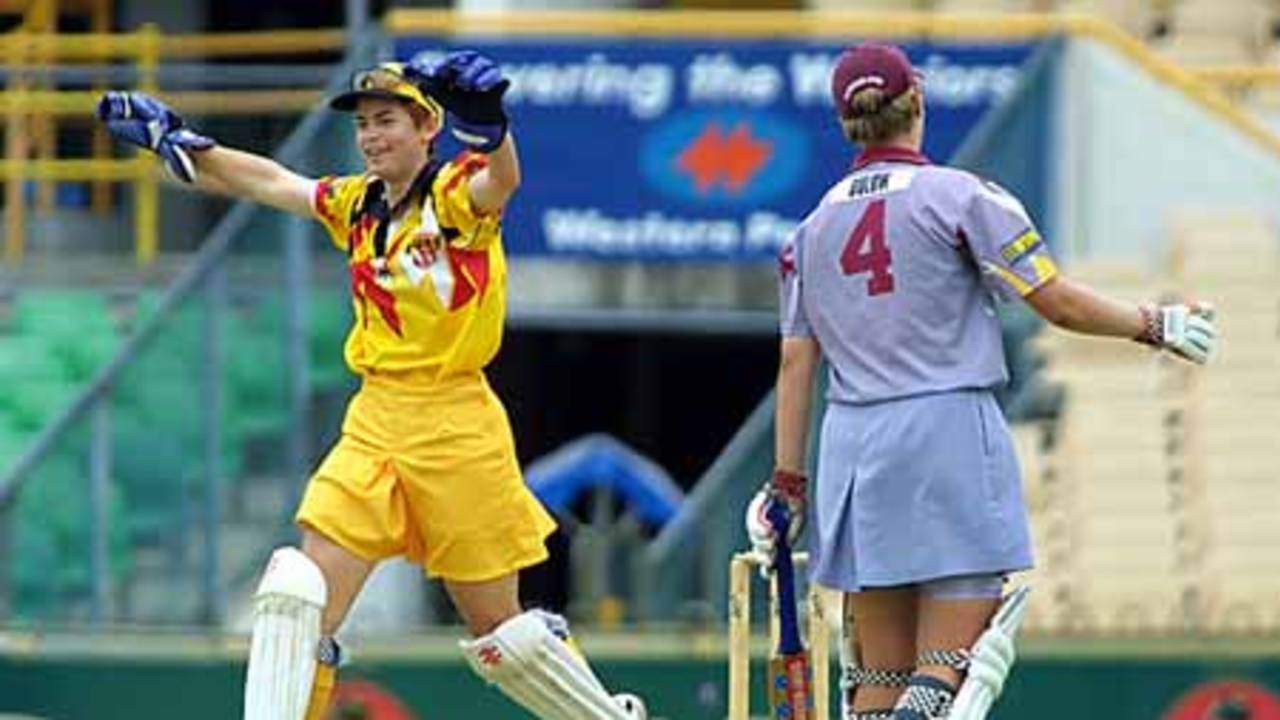 Western Australia keeper Michelle Cobb celebrates the end of Bulow, the Queensland batter