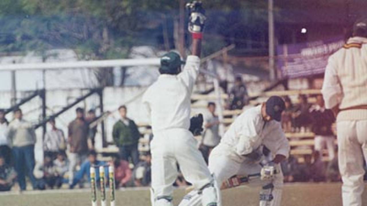 The Orissa stumper Gopal goes up in joy as Parrida takes a catch. Ranji Trophy East Zone League 2000-01, Assam v Orissa Tinsukia District Sports Association Stadium, 4-6 Jan 2001