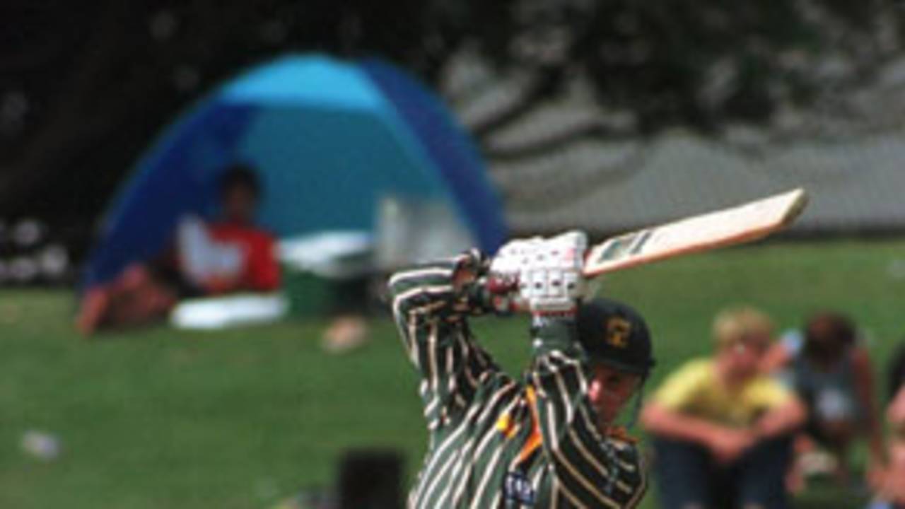Central Districts batsman Mark Douglas drives in the air back down the ground during his innings of 20. 1st Shell Cup Final: Central Districts v Canterbury at McLean Park, Napier, 24 January 2001.