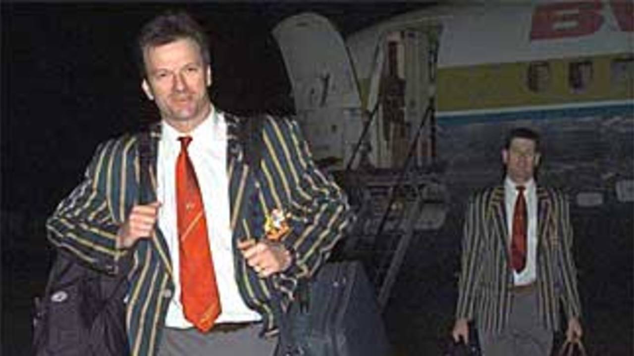 Steve Waugh, newly named captain of the Australian cricket team, left, arrives at the V.C. Bird airport in St. John's, Antigua, Friday, February 19, 1999, for the Australian tour of the West Indies. Australia will play a three-day exhibition mat