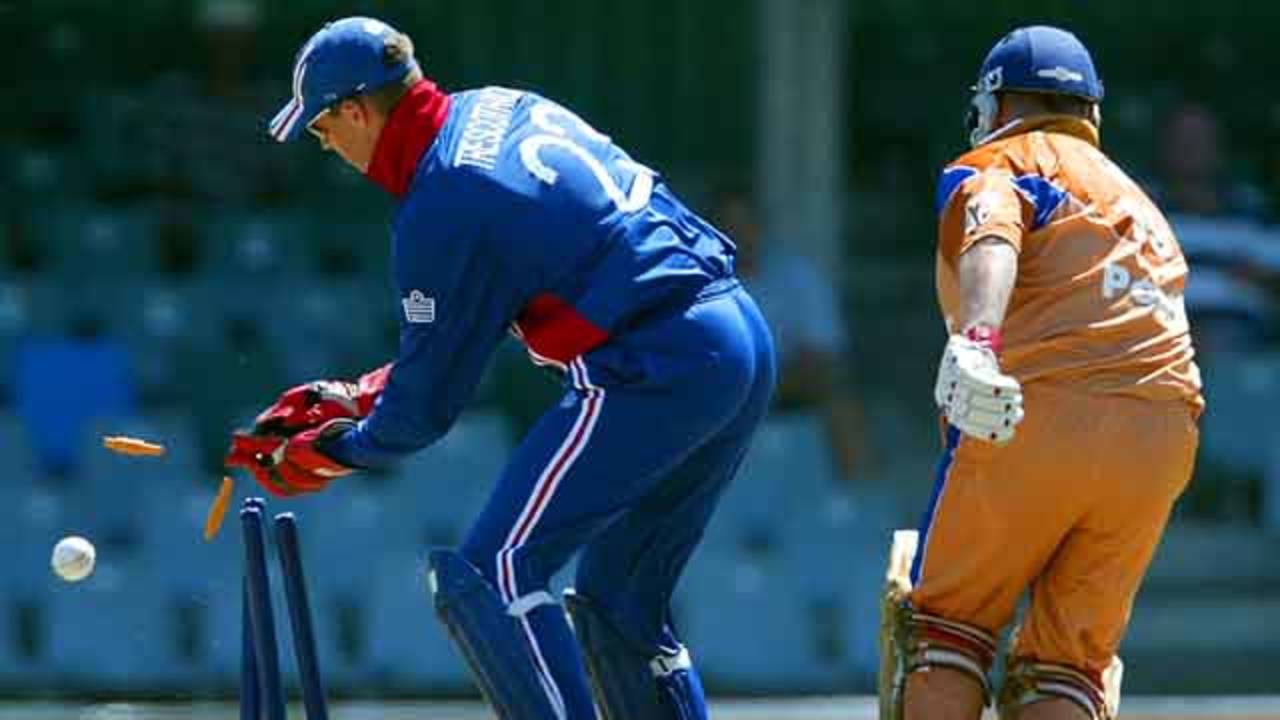 Border Bears Steven Pope survives a run out attempt from England's wicket keeper Marcus Trescothick during their World Cup warm up match against Border Bears at Buffalo Park in East London, South Africa, February 6, 2003.