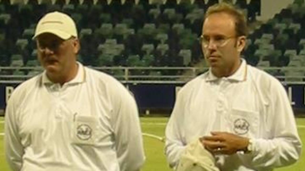 Officiating in the WACA Sunday League Final, Umpires Bruce Bennett (L) Andrew Craig (R) listen to the man of the match making is speech