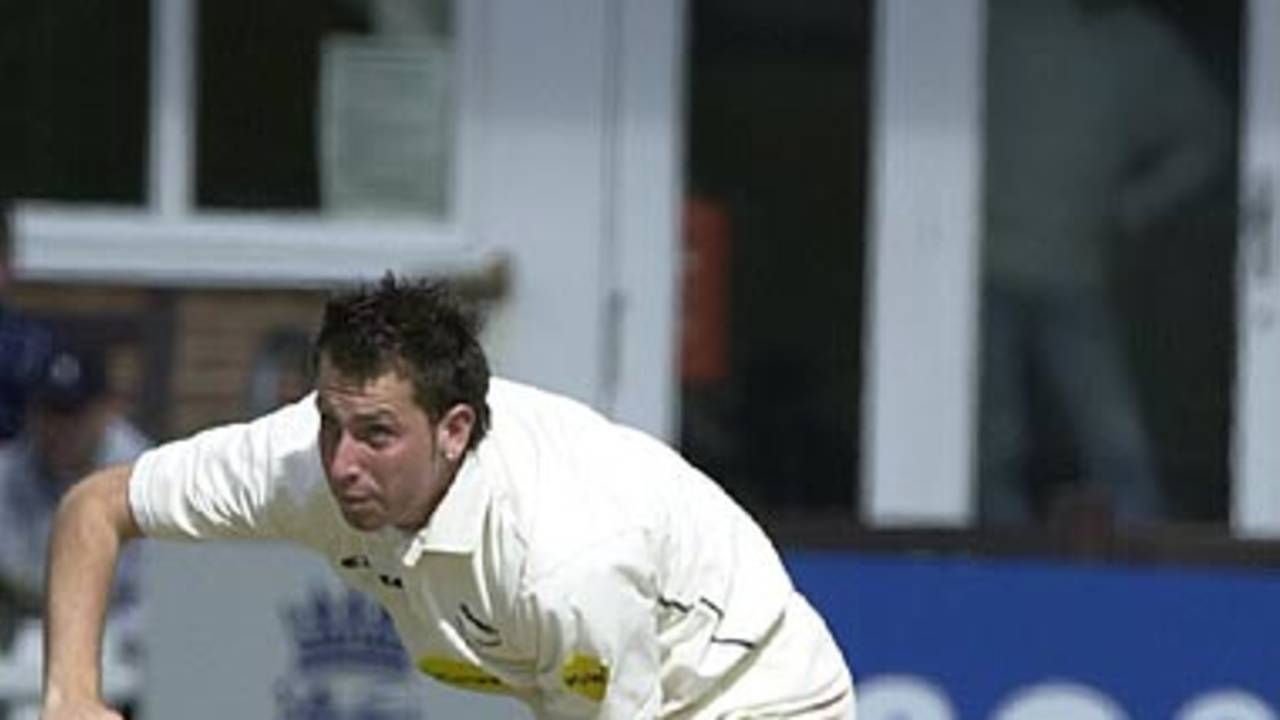 Matthew Whiley bowling on the 2002 season opening day