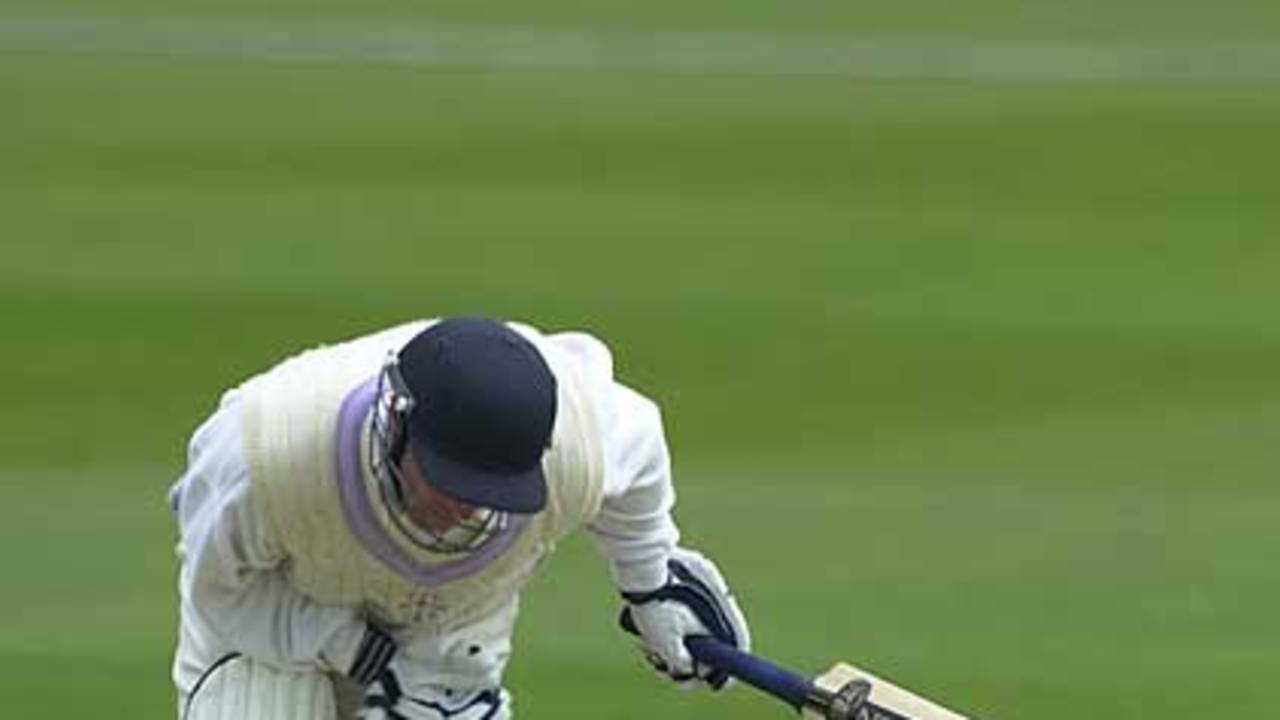 Matthew Banes is struck a painful blow in the university first innings