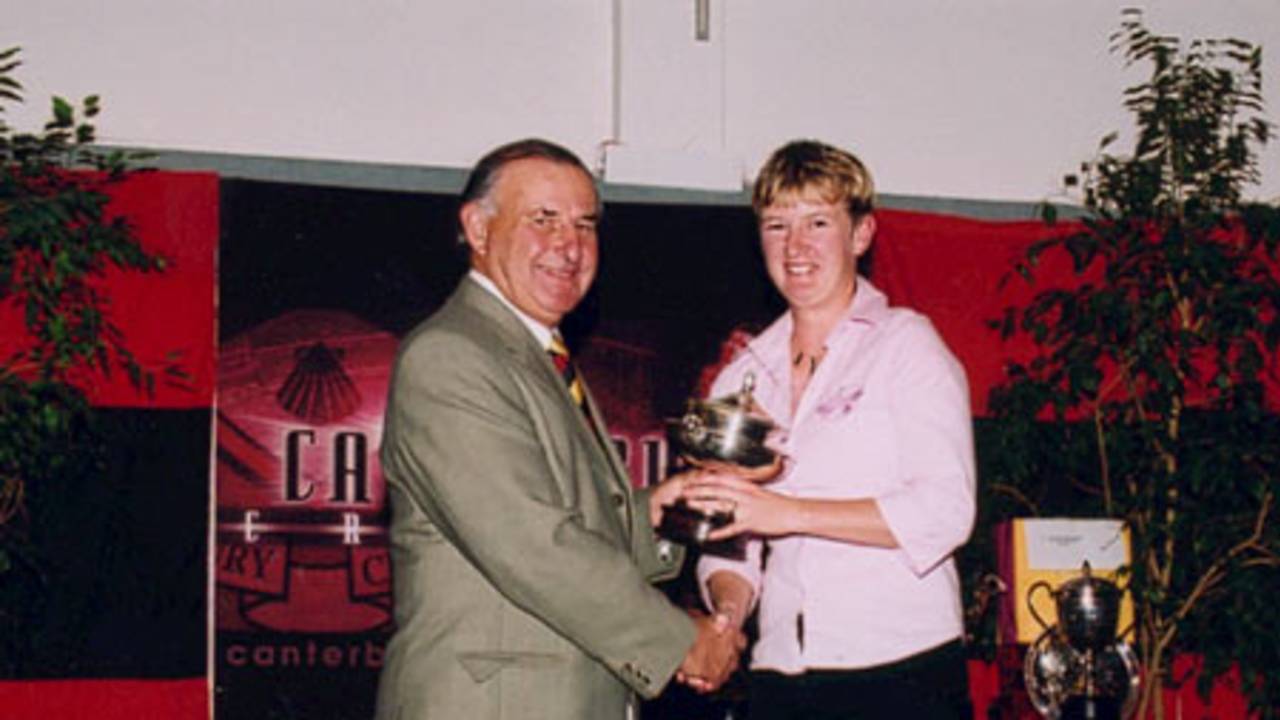 East Christchurch-Shirley bowler Helen Daly (right) receives the Felton Trophy for taking the most wickets in women's first grade from Canterbury Cricket Association president Brian Adams. Canterbury Cricket Association Awards 2002/03 at the Canterbury Horticultural Society Hall at Christchurch, 10 April 2003.