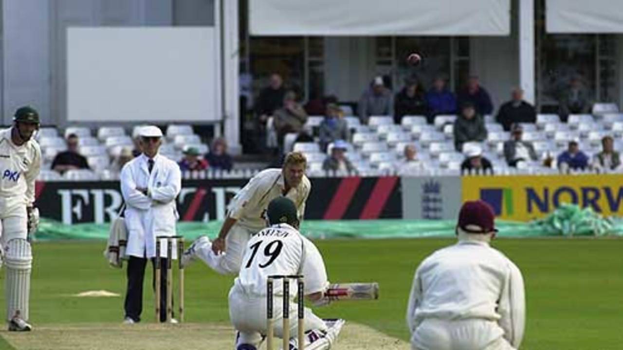 Northants Darren Cousins sends down a short ball to Guy Welton of Notts, Frizzell County Championship, Trent Bridge, 25 May 2002