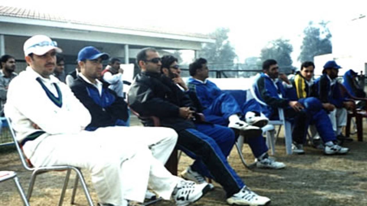 Afghan team officials and players during a Cornelius Trophy 2002-03 match in Pakistan