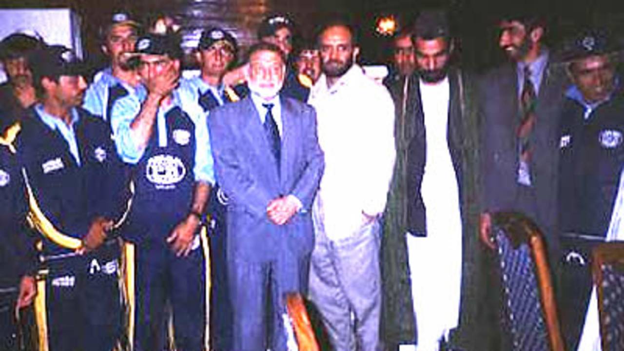 From left: Planning Minister Ahmad Yousaf Nooristani (suit), President of National Sports Committee Mohammad Anwer Jigdalak, Ministerial Advisor Shahzada Masood, ACF President Allah Dad Noori and others during the ACF Annual General Meeting held in Kabul, 25 July 2003.