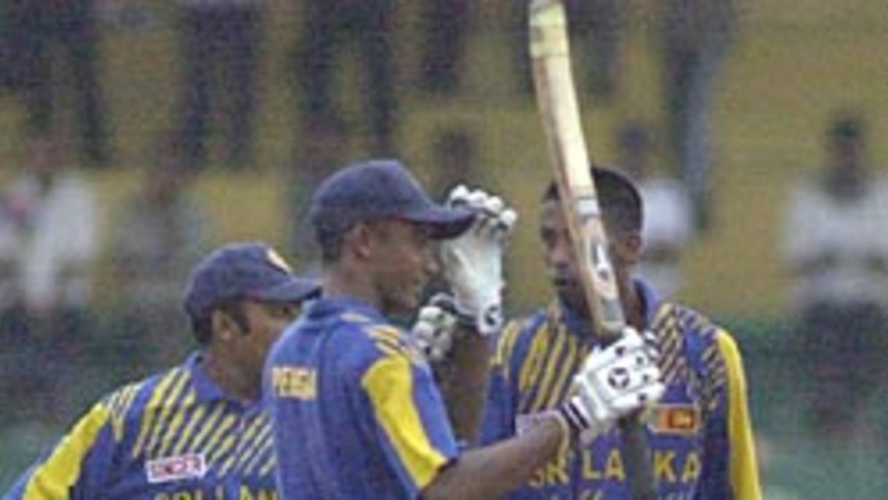 Perera toasts his maiden ODI fifty even as Arnold eggs him on