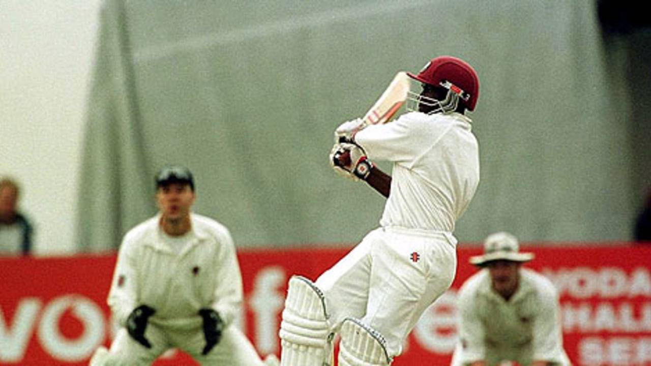 25 Aug 2000: Wayne Phillip of the West Indies hits out during his 67 not out during the Somerset v West Indies Vodafone Challenge match at Taunton, Somerset.