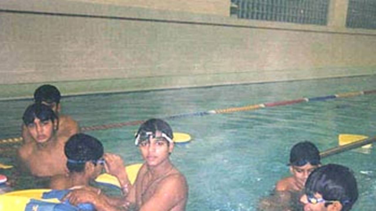 Deepak Chougule, Vinayak Mane and Parthiv Patel in the swimming pool in Adelaide