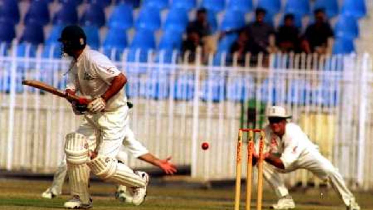 Hick reaches for the catch as Imran Abbas edges, 4-day match PCB Patrons XI v England XI at Rawalpindi Cricket Stadium, 1-4 November 2000
