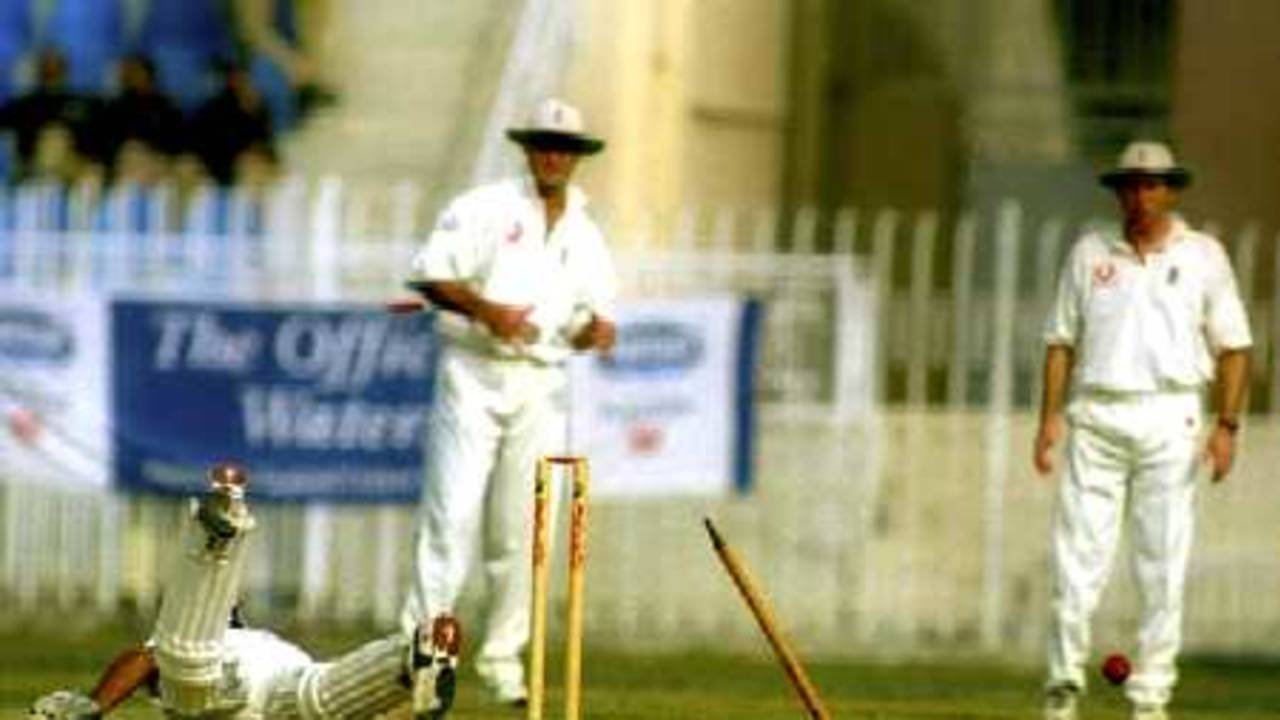 Run out by Hoggard, Kamran stumbles to cover his ground
