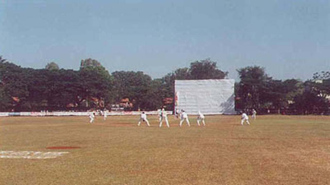 Mansoor Ali Khan in action from the police quarters end, Ranji Trophy South Zone League, 2000/01, Karnataka v Andhra, Union Gymkhana Ground, Belgaum, 15-18 November 2000 (Day 1).