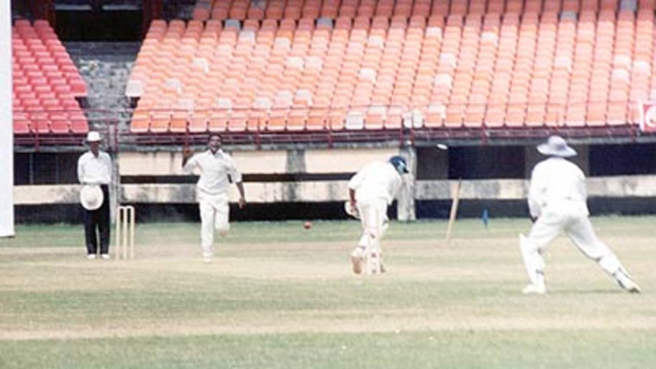 Renjith Menon is delighted as he cleaned up N Kalekar, Ranji Trophy South Zone League, 2000/01, Kerala v Goa, Nehru Stadium, Kochi, 15-18 November 2000.