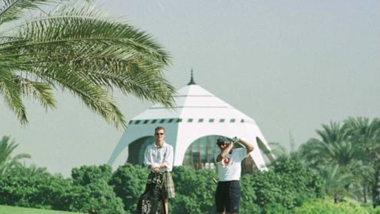 Champion's Trophy, Dec 1997 England's Dougie Brown and Alec Stewart relax on the golf course as they await the result of the India-West Indies game