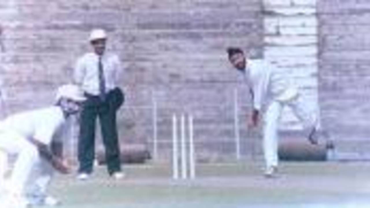 Sukhbinder Singh of Assam just about to deliver the ball. Ranji Trophy East Zone League, 2000/01, Tripura v Assam, Maharaja Bir Bikram College Stadium, Agartala, 14-16 December 2000.