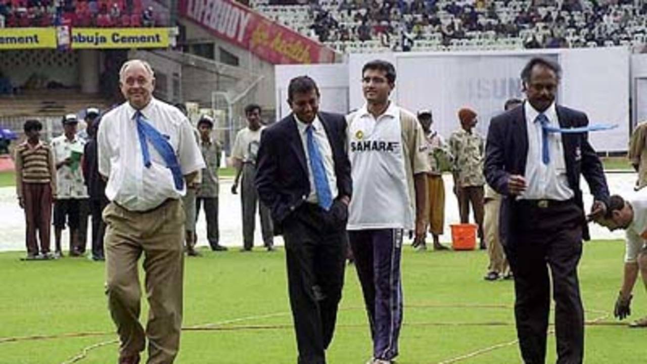 Match referee Denis Lindsay, left, with Indian skipper Ganguly and match officials